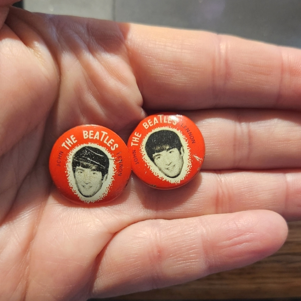 2  1964 buttons that features john Lennon from the beatles